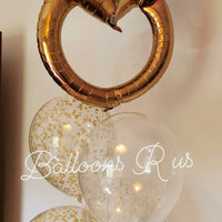 Engagement ring with helium balloons