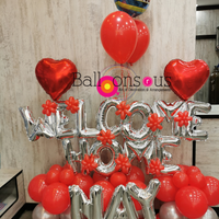 Welcome Home with heart balloons